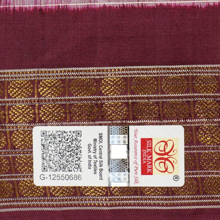 Close-up of luxurious silk fabric texture and intricate weave details of the multi-color Sambalpuri saree.