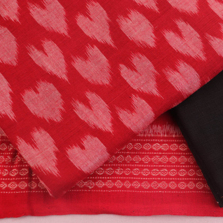 Detail of the Sambalpuri red-black cotton dress material blouse piece with motifs.