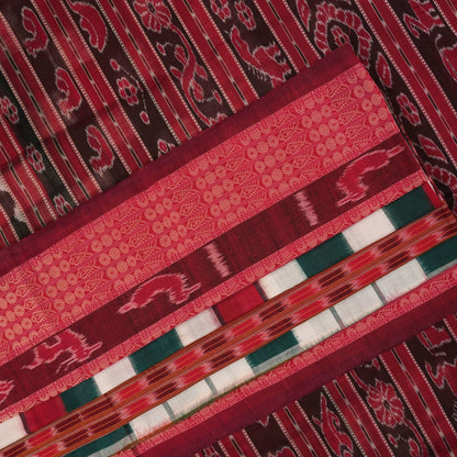 Model draped in a green and maroon pasapalli Sambalpuri cotton saree for a traditional ethnic look.