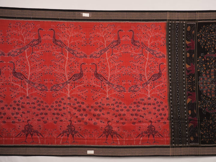 Full layout view of a rust and black Sambalpuri cotton saree displaying the complete body pattern and motifs.