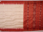 Khandua silk saree styled; white with red butta design, showcasing drape and overall look.