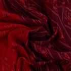 Red and blue Sambalpuri cotton saree draped to show styling and overall look.