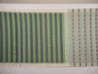 Full-length layout of the green and white striped Sambalpuri cotton saree showing the complete design.