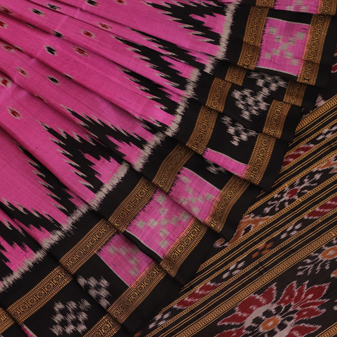 Pink Khandua Silk Saree with black motifs, styled and draped in traditional fashion