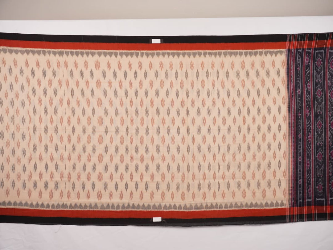 Full styling of a cream and black Sambalpuri cotton saree with traditional motifs on a model.