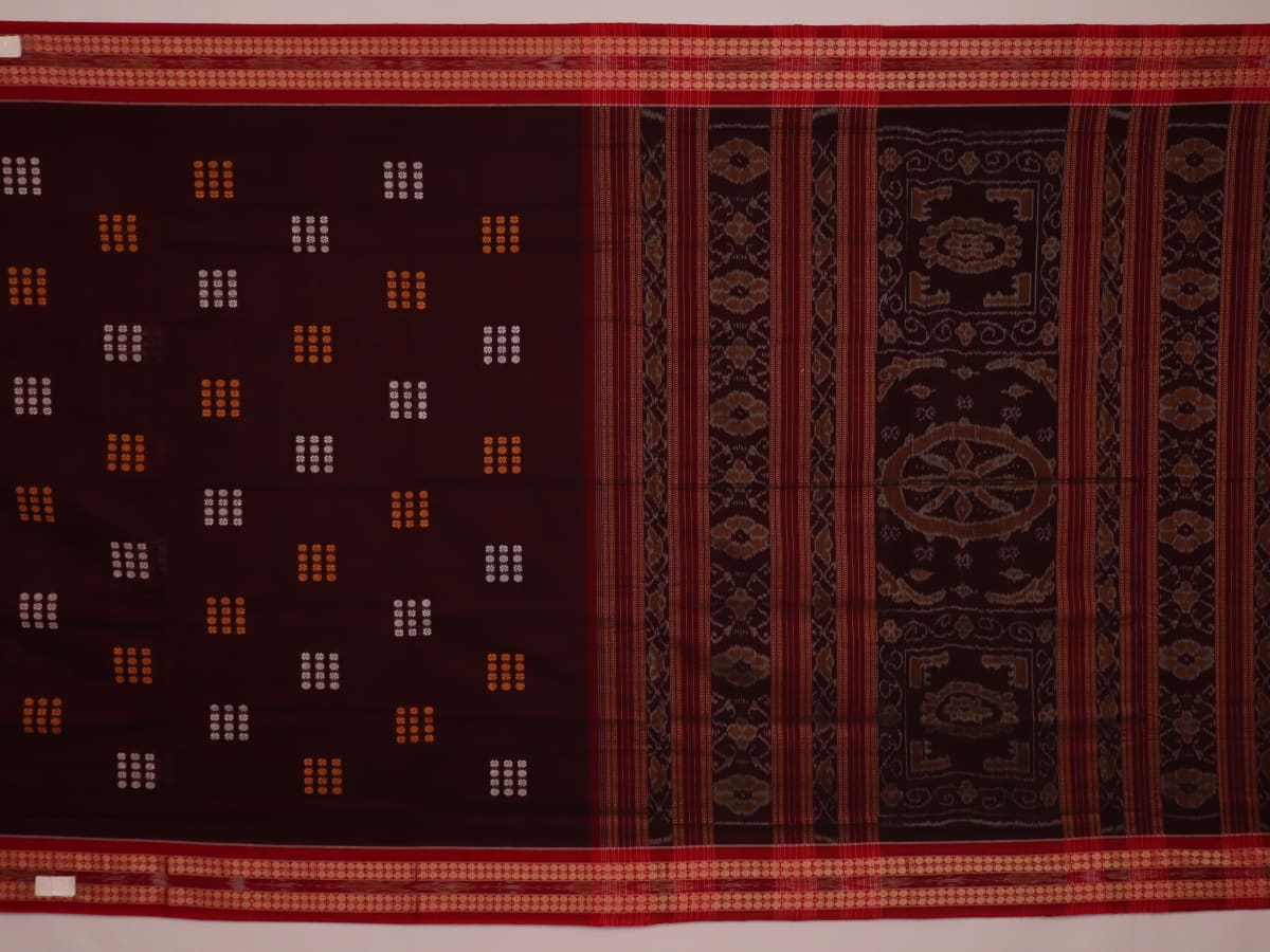 Full view of a maroon cotton Bomkai saree featuring a butta pattern with a red border and pallu.