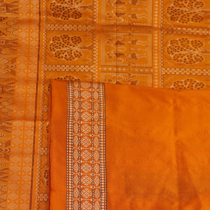 Close-up of Bomkai silk saree fabric texture in white with yellow butta pattern.
