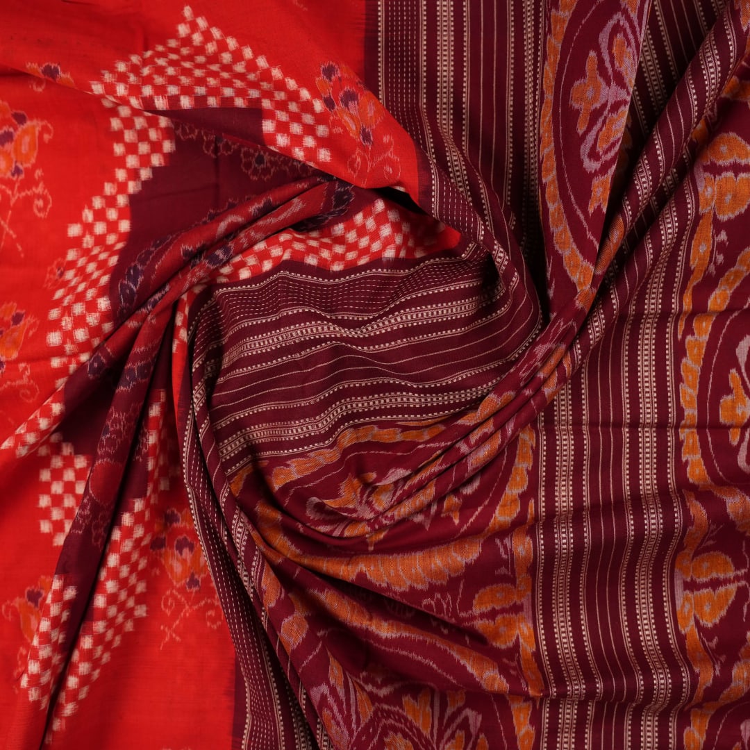 Full view of the orange and maroon Sambalpuri cotton saree showcasing the iconic Pasapalli checkerboard pattern.