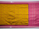 Extreme close-up of Bomkai Silk Saree fabric, highlighting its luxurious texture and handloom weave.