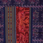 Full flat layout of maroon and blue Sambalpuri cotton saree with traditional motifs and ikat border.