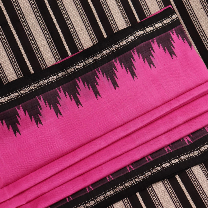 Close-up showcasing the intricate silk fabric texture of a pink and black Berhampuri silk saree with a butta pattern