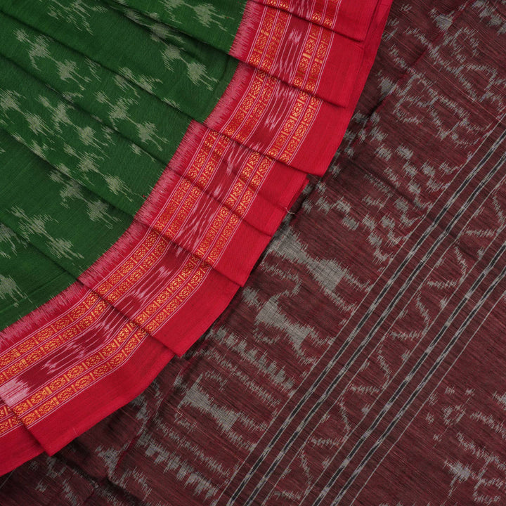 Model draped in a green and red Sambalpuri cotton saree with traditional motifs, styled for a classic look.