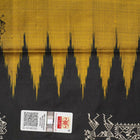 Macro close-up of Bomkai Silk Saree fabric, showing intricate brown & black silk weave.