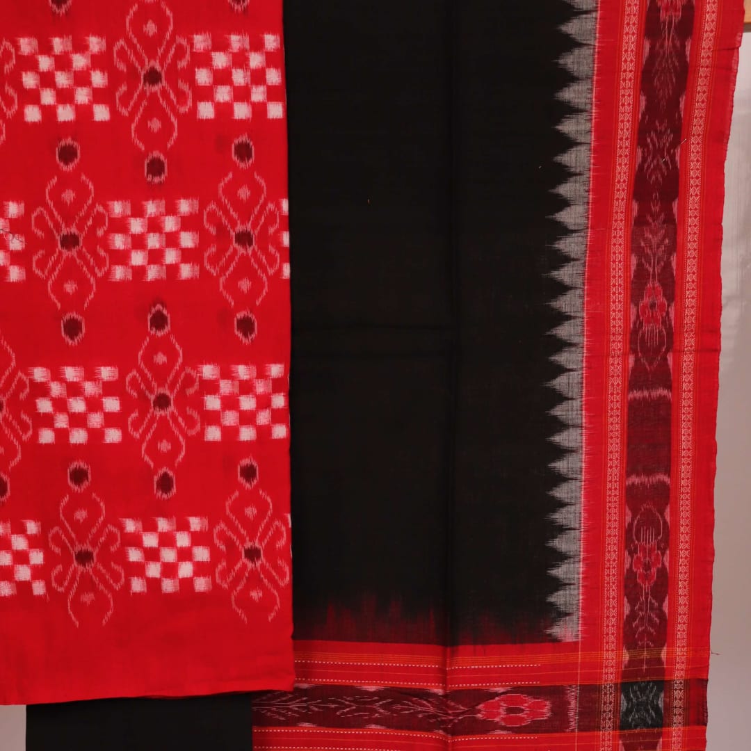 Close-up detail of black Pasapalli pattern on red cotton Sambalpuri dress material blouse piece