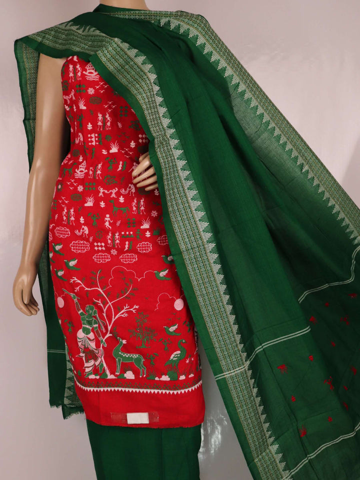 Red and green cotton Sambalpuri dress material with a doll pattern on the body of the fabric.