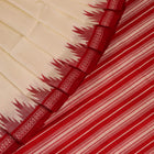 Close-up of plain white silk fabric with intricate Berhampuri weaving in red