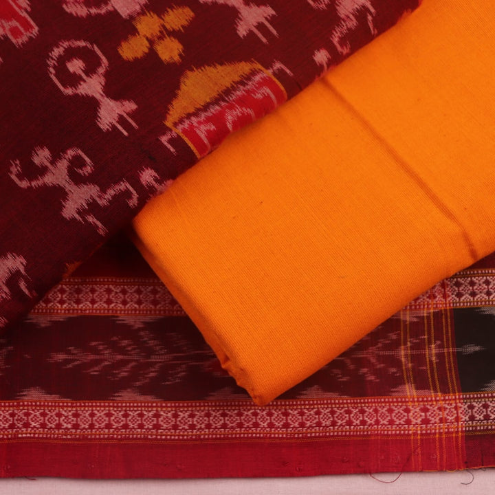 Detail of Sambalpuri cotton dress material blouse piece, maroon and yellow motifs.