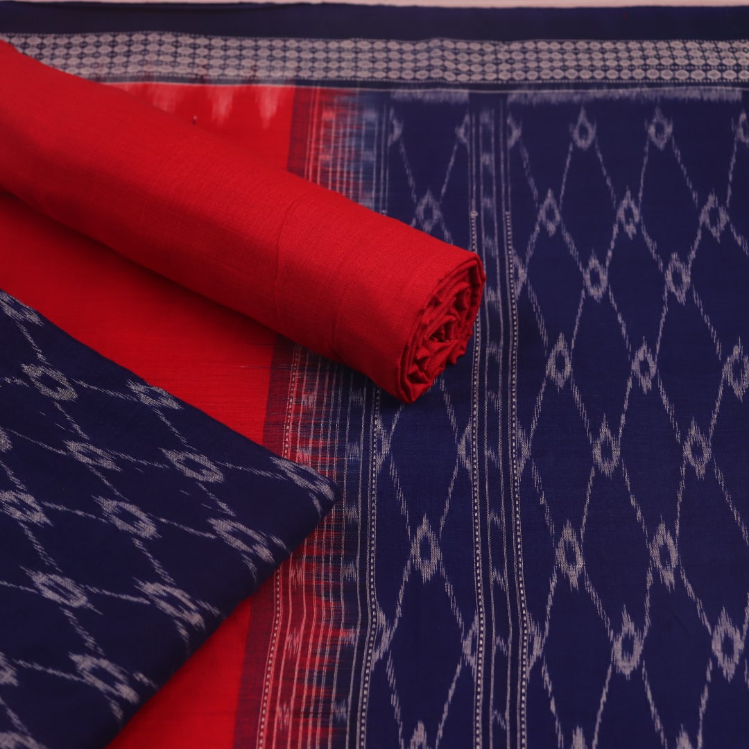 Detail of blue and red Sambalpuri cotton dress material blouse piece with motifs.