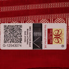 Close-up of multicolored silk Sambalpuri saree fabric showing intricate handloom weave texture.