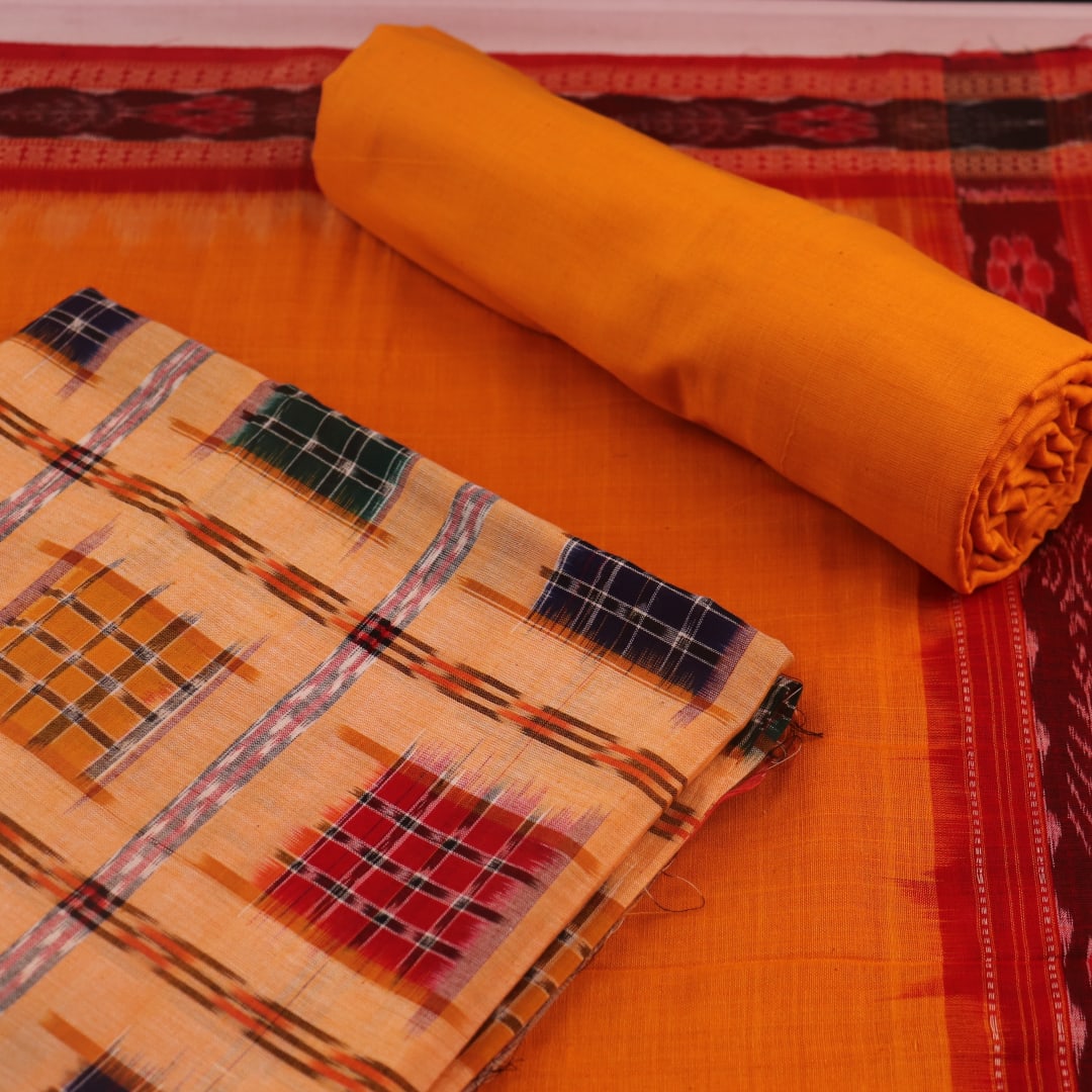 Detail of cream and yellow motif Sambalpuri cotton blouse piece.