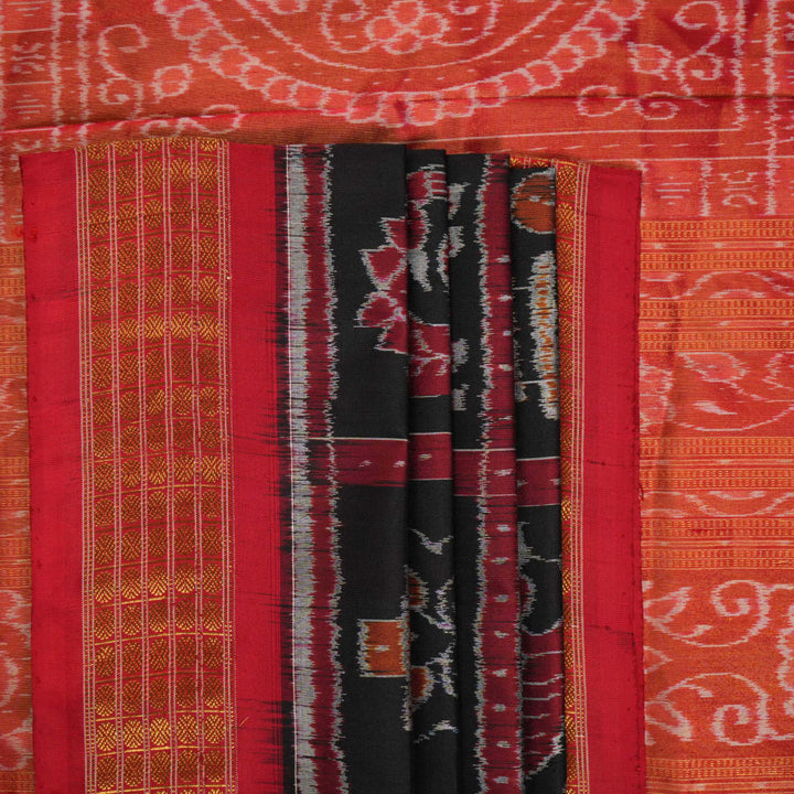 Close-up of Sambalpuri silk saree fabric, revealing rich texture, weave, and subtle tissue motifs.