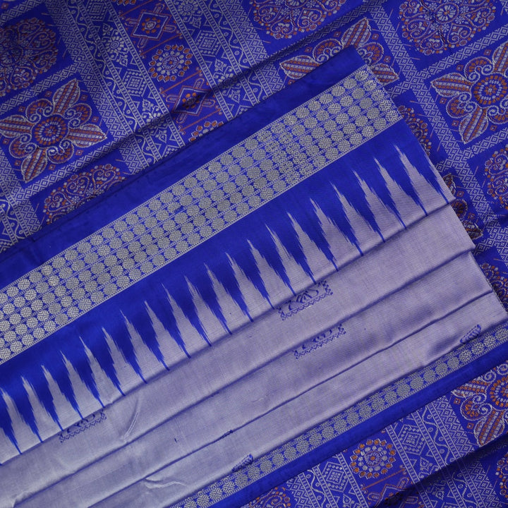 Ultra close-up of Bomkai Silk Saree fabric, highlighting the exquisite grey and blue weave texture.