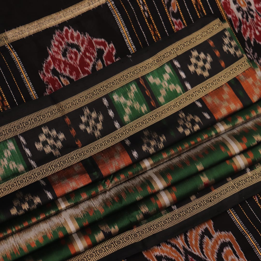 Full view of a Green and Black Khandua Silk Saree with intricate motif patterns.