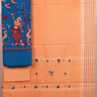 Close-up of the blouse piece showcasing the Doll pattern in blue and brown on cotton fabric.