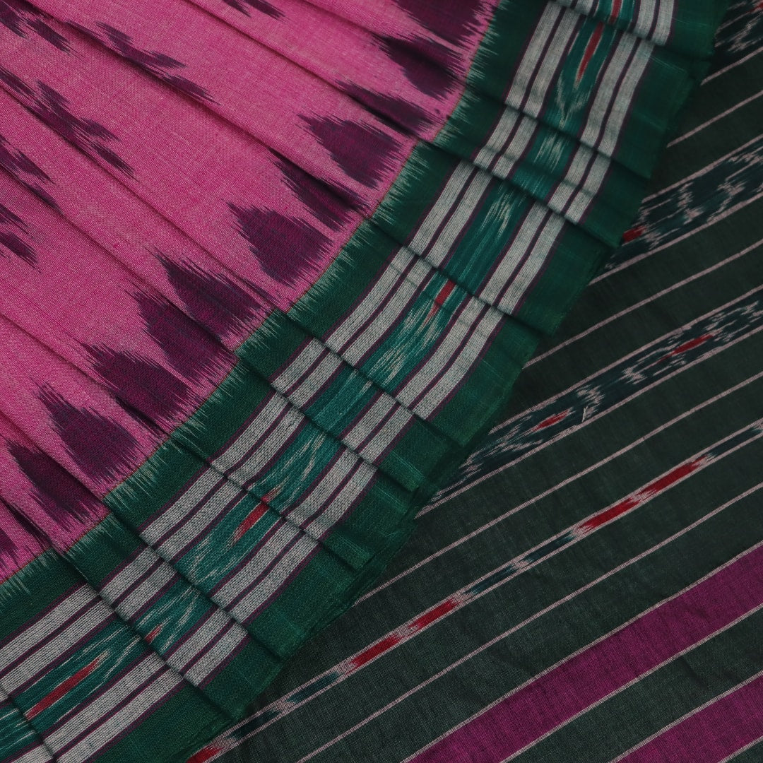 Pink and green Sambalpuri cotton saree with motifs, elegantly draped on a model.