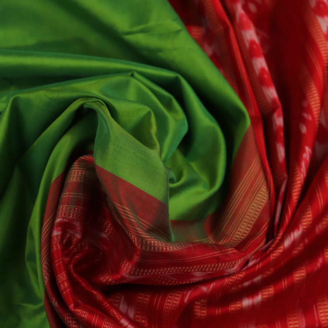 Close-up view of light green Pasapalli pattern woven on silk Sambalpuri saree fabric