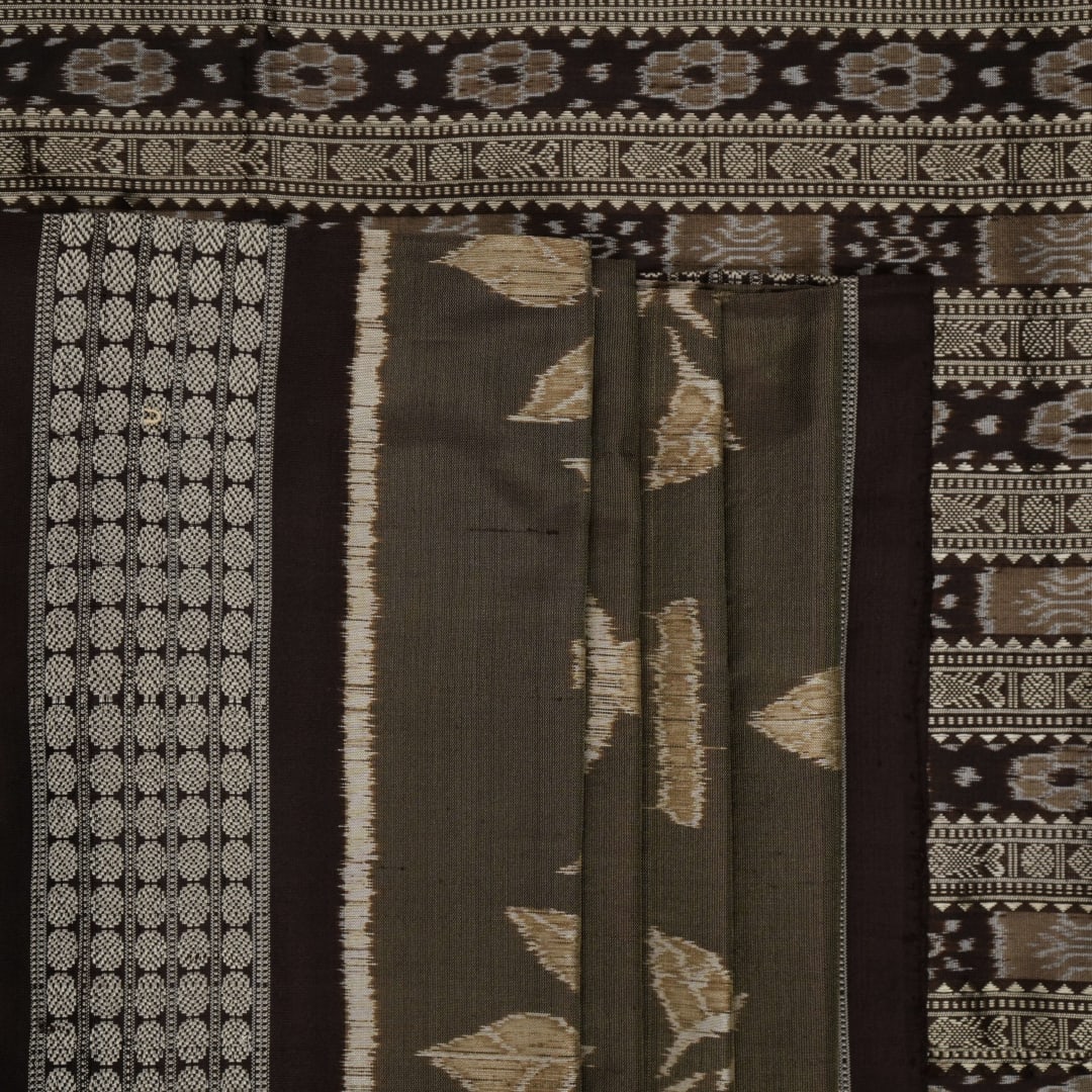 Close-up of the grey and black Sambalpuri Silk Saree fabric, highlighting its rich silk texture and weave.