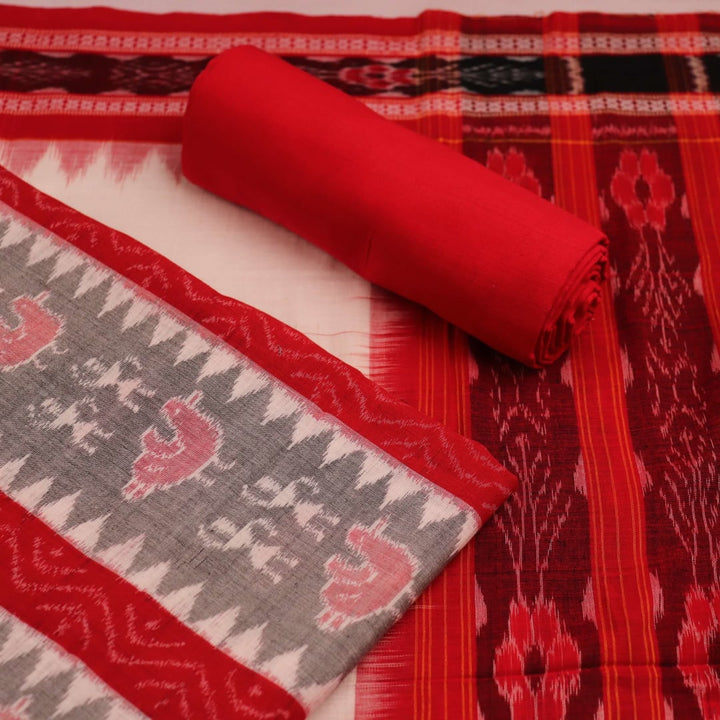 Close-up view of blouse piece with Sambalpuri motifs in grey and red cotton