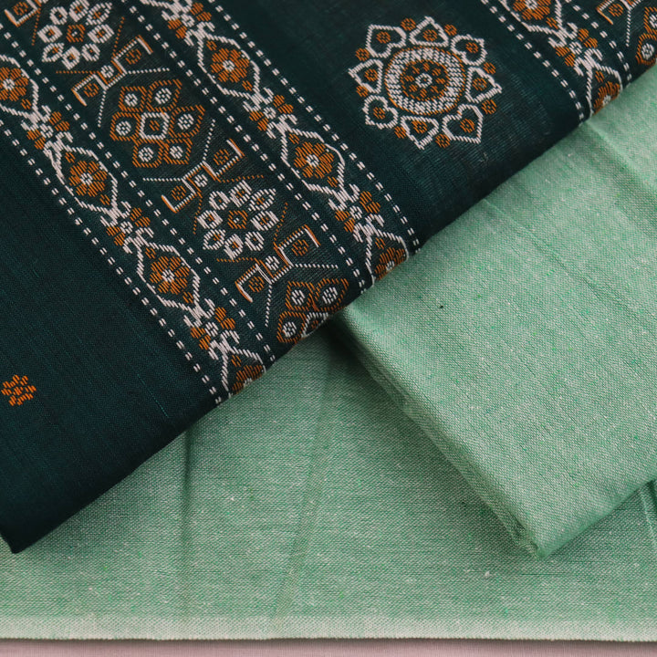 Coordinating green Bomkai cotton blouse piece with subtle weave details.