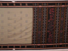 Full product view of a grey Bomkai cotton saree featuring black butta patterns.