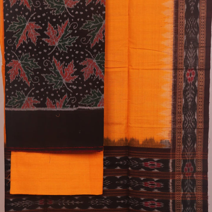 Close-up of the brown and yellow Sambalpuri cotton dress material blouse piece, with motifs.