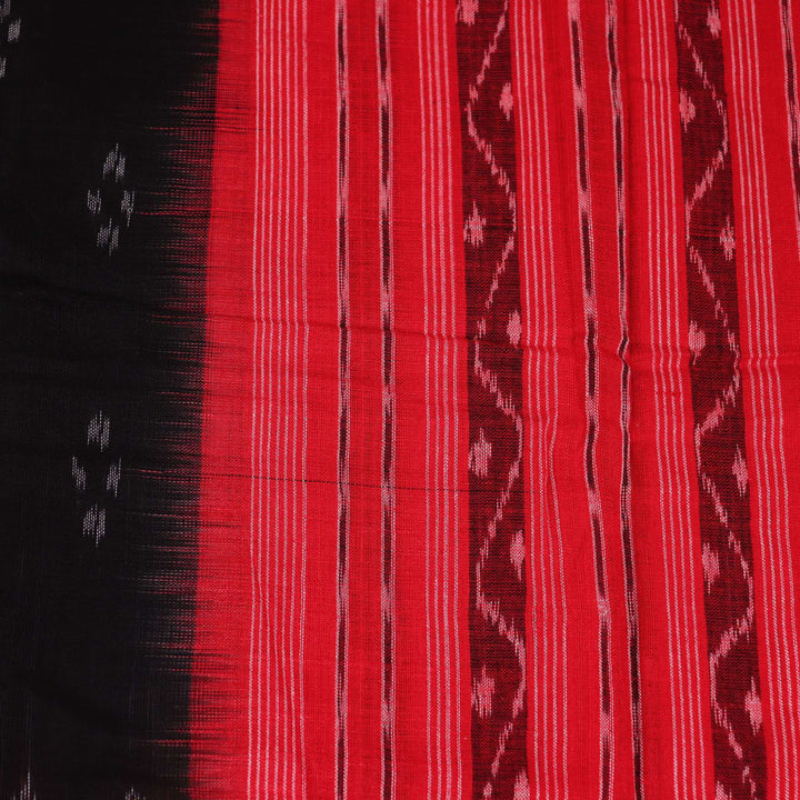 A model drapes a black Sambalpuri cotton dupatta with red motifs and pallu border.