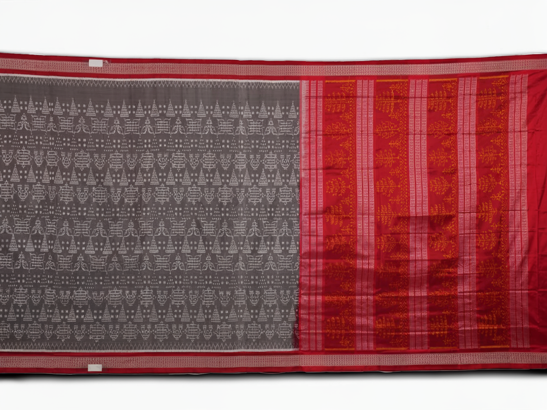 Close-up of the soft, lustrous grey Sambalpuri silk fabric texture, highlighting the intricate weave and motifs.