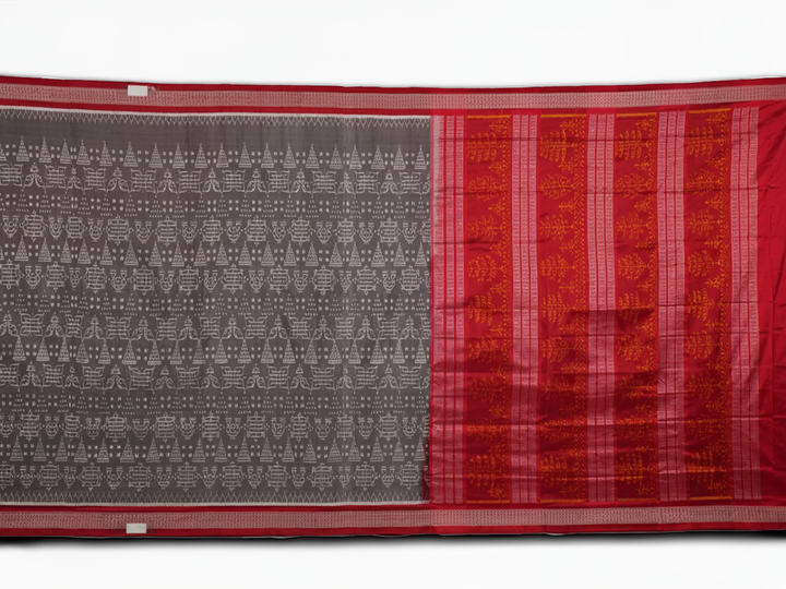 Close-up of the soft, lustrous grey Sambalpuri silk fabric texture, highlighting the intricate weave and motifs.