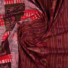 Model wearing a multi-color and maroon Sambalpuri cotton saree in a traditional Pasapalli weave