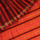 Close-up of multi-color striped Sambalpuri Silk Saree fabric texture.
