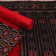 Detail of the black and red motif blouse piece of the Sambalpuri cotton dress material.