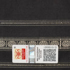 Extreme close-up revealing the fine handloom texture and intricate weave of the Bomkai silk fabric.