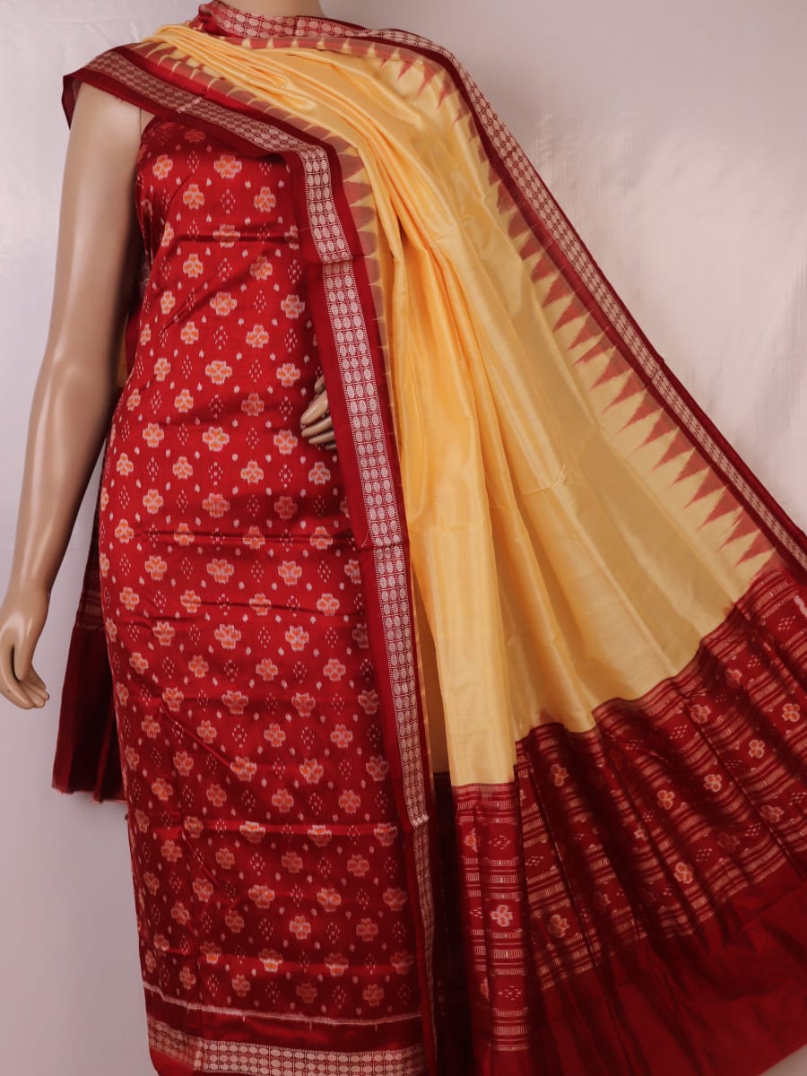 Detail of the Maroon and Off White Sambalpuri Silk Dress Material blouse piece with motifs.