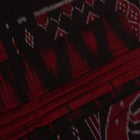 Gracefully draped maroon and black plain Sambalpuri cotton saree.