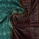 Full flat layout of green and maroon Sambalpuri cotton saree showcasing the complete body and pallu motifs.