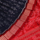 Close-up view of the blue silk Sambalpuri saree's fabric texture showcasing intricate motifs in red
