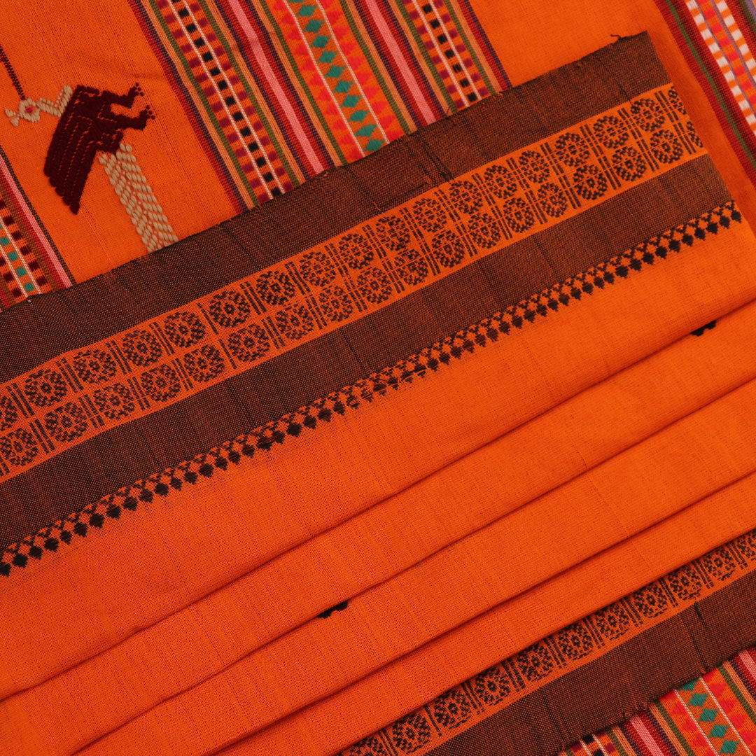 Full-length view of an orange cotton Berhampuri saree with a butta pattern and broad orange borders.