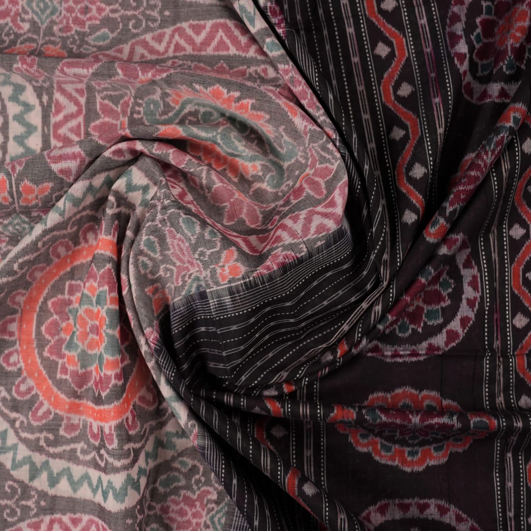 Full length flat layout of a brown and multi color Sambalpuri cotton saree highlighting the complete pattern.