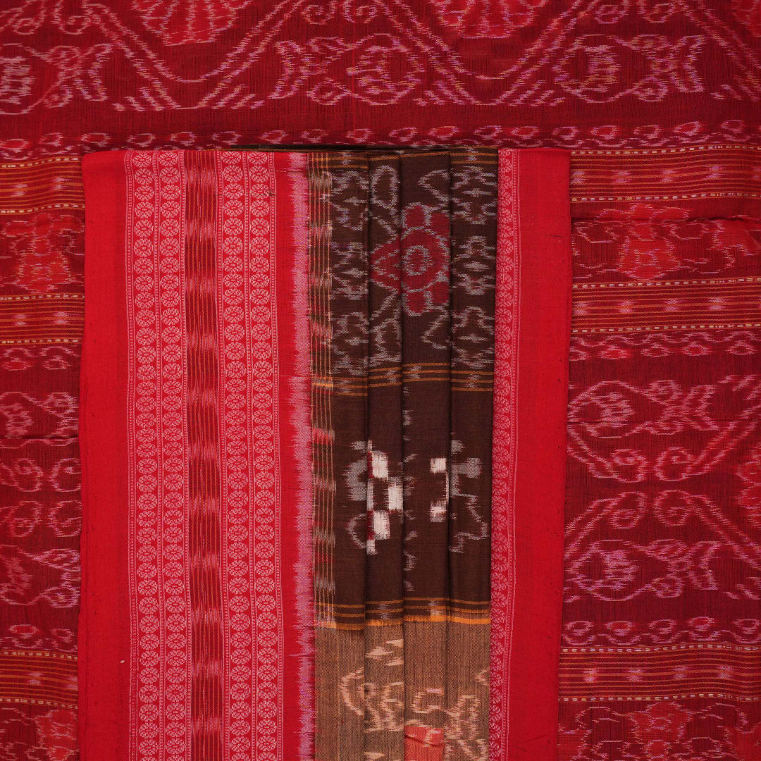 Model draped in brown and red Pasapalli Sambalpuri cotton saree showcasing traditional Odisha handloom