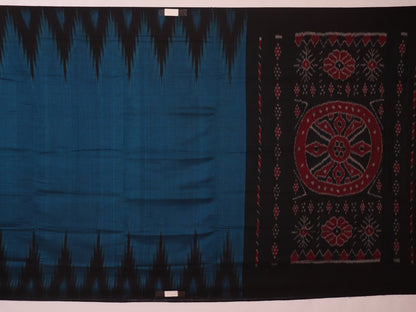 Draped plain blue and black Sambalpuri cotton saree.